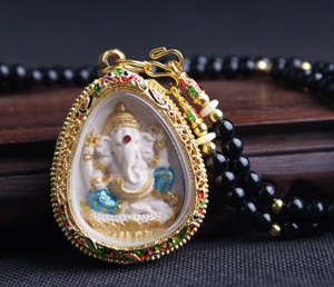 泰國佛牌原廟龍婆墾開光 銀色四面佛的招財求子與助生意之奧秘